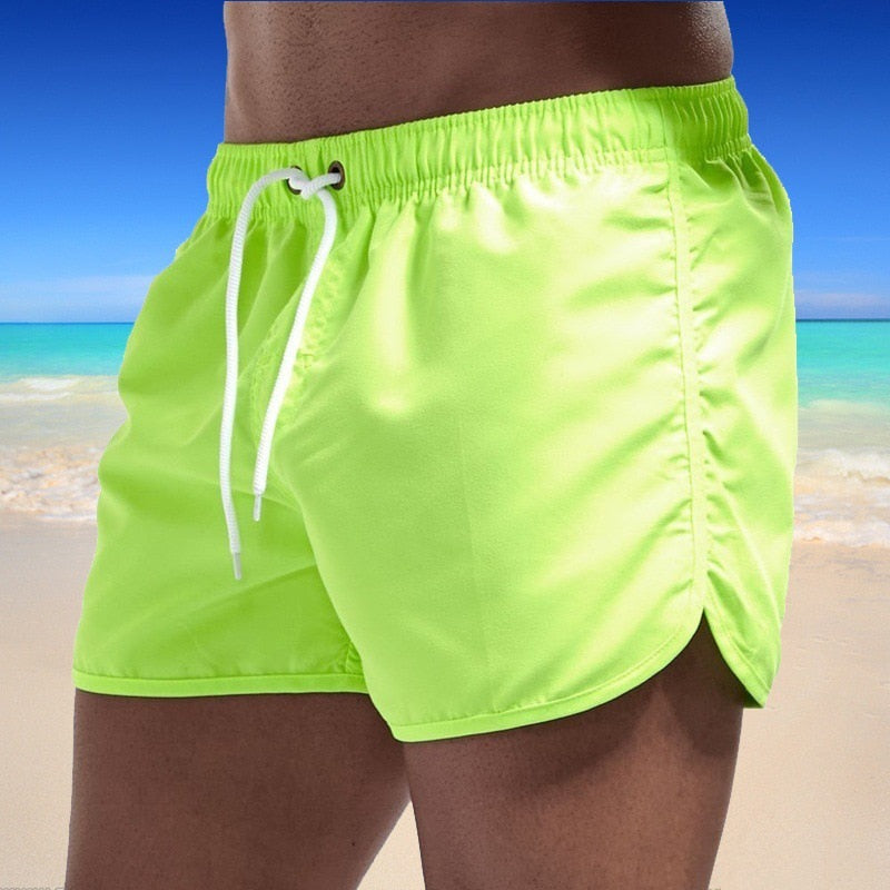 Bañador de verano 2021 para hombre, pantalones cortos, ropa de playa de marca, traje de baño para hombre, ropa de playa transpirable de cintura baja, ropa de Surf